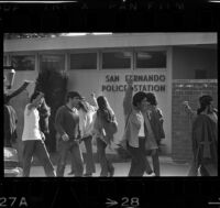 Chicano Moratorium Committee demonstrators picket the San Fernando Police Department