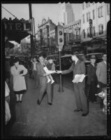 Selling newspapers in Little Tokyo, Los Angeles, 1941
