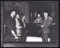Judge Crail presides during the trial of Harry Garbutt with Attorney C. O. Bacon present, Los Angeles, 1924-1926