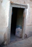 Grave of Ahmad Khan Mardanzai seen through doorway