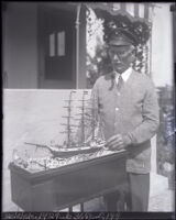 Herman Auskulat with model ship he built, Santa Monica, 1931