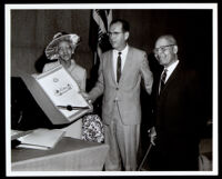 Dr. Vada Somerville receives an award from County Supervisor Kenneth Hahn, Los Angeles, 1960s