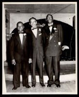 Loren Miller and two others at a black tie event, 1960s