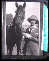 Mary Landon Baker with her thoroughbred horse Jane True, Santa Barbara, 1922