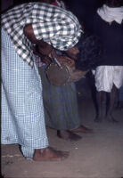 Mannan man attaches a skin to a drumhead at a festival of the Mannan Ādivāsī people, Mannakudi (Tamil Nadu, India), 1984
