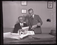 City Treasurer of Venice E. H. Racek meets with Los Angeles City Treasurer Ned T. Powell, Los Angeles, 1925