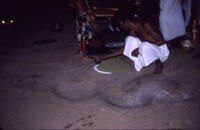Sarpam Thullal Pulluvan Serpent Ritual - ritualists create a kalam drawing of an entwined serpent, Peramangalam (India), 1984