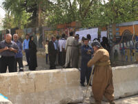 Voting in Sulaimani, people looking for their names