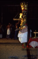 Theyyam festival - Thirayāṭṭam performance with a dancing aṅkakkāran (fighter) character, Kalliasseri (India), 1984