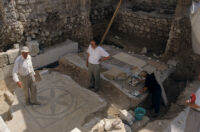 W. Kolataj & USAID's Seifalla Hasanein by an excavated mosaic