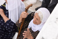 An old woman wearing Kurdish clothes