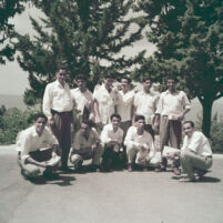Outdoor group portrait of Suhayl Jabbur and his students