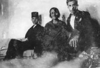 Indoor portrait of Jibrail and Asma Jabbur with unidentified person