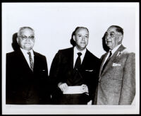 Louis M. Blodgett with two other men, circa 1950
