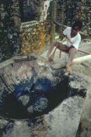 Worker melting asphalt to make the bituminous mortar for the waterproofing of the Batterie des Princesses