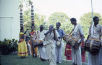 Om Periyaswamy dance troupe with Nāiyāndī Mēḷam musicians and Karakāṭṭam dancers, Madurai (India), 1984