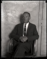 Harry Alpine seated after being charged in a shooting, Los Angeles, 1925