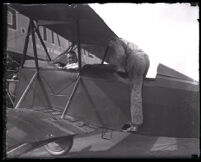John W. Beretta and Henry B. Du Pont in an airplane at Vail Airport, Montebello, 1927