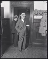 Jacob Berman and an associate entering or exiting a law office, Los Angeles, 1929-1930