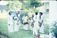 Om Periyaswamy with Nāiyāndī Mēḷam musicians with instruments at Tamilnadu Hotel, Madurai (India), 1984
