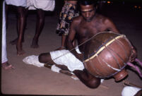 Sarpam Thullal Pulluvan Serpent Ritual - O. K. Raman demonstrates a Pulluvan kudam *clay "pot"), Peramangalam (India), 1984