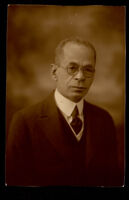 Man wearing a suit and glasses, Brooklyn, 1880-1910