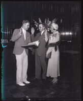 Benno M. Brink and Margaret Mayer being sworn in by Superior Judge Samuel R. Blake, Los Angeles, 1931