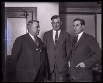 Joseph Fitzpatrick with lawyers Thomas White and Otto Emme during his trial for accepting a bribe, Los Angeles, 1925