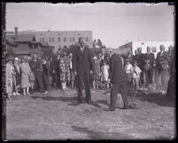 J. S. Severance with a full shovel during the First Unitarian Church groundbreaking, Los Angeles, 1926