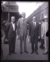 Hiram Bingham and Carroll L. Beedy greeted at a train station, Pasadena, circa 1930