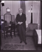 Justice John H. Clarke standing for a photo, Los Angeles, 1922