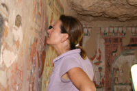 Dr. Melinda Hartwig, project director, working in tomb, on Broad Hall Far Right wall