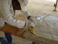 Stage 5: Removing glue from mosaics and cleaning them 