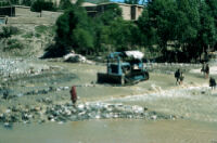 Bulldozer Removing Boulders at Faizabad