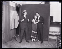 Actor Eddie Borden, actress Midgie Miller and another actor pose in costume, Los Angeles, circa 1920s