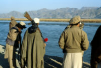 Mujahideen Stands Next To The River