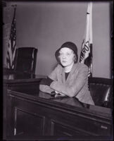 Actress Ruth Channing seated in a courtroom, Los Angeles, 1934
