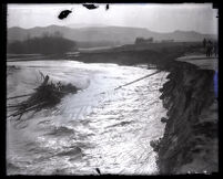 Debris from a bridge over the Los Angeles River at Dark Canyon Drive that was washed away by a flood, Los Angeles, 1927