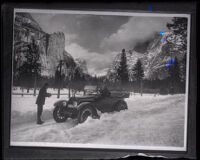 Cadillac coupe traversing a snowy but cleared Glacier Point Trail, Yosemite National Park, circa 1921
