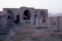 Mosque With Various Headstones in Foreground