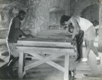 Pierre Rey Millet and ISPAN carpenters working on the restored Main Gate of the Citadelle