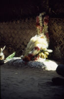 Villupāttu event - garlands, areca nut blossoms, bananas, and other ritual materials for a trance medium, Achankulam (India : Village), 1984