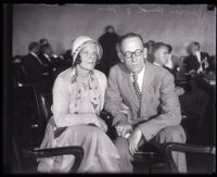 Laura Bird and Owen Bird seated in a courtroom during Owens trial for the murder of Percival G. Watson, Los Angeles, 1929