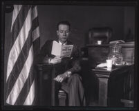 Attorney Thomas Bunn seated in a witness stand, Los Angeles, 1929-1930