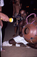 Sarpam Thullal Pulluvan Serpent Ritual - O. K. Raman demonstrates a Pulluvan kudam *clay "pot"), Peramangalam (India), 1984