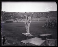 Harry Horner Barnhart conducting the congregation in song during Easter services at the Coliseum, Los Angeles, 1925