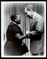 Richard Nixon greeting an unidentified woman, 1950-1970