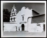 Artists Hale Woodruff and Charles Alston at the Mission San Diego de Alcalá during the Golden State Mutual mural research tour, San Diego, 1948