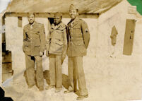 Alfred Thomas Quinn with fellow soldiers outside Day Room during World War II