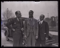 Stunt driver Hayward Thompson with his manager W. H. Watson and his Pontiac Six, Angeles, circa 1927